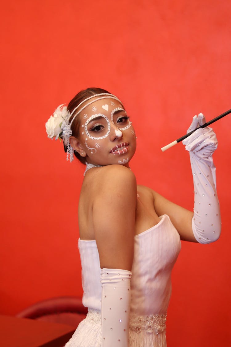 Portrait Of African Woman With A Painting On Her Face 