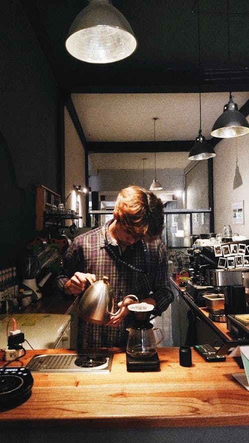 Man Working at Cafe