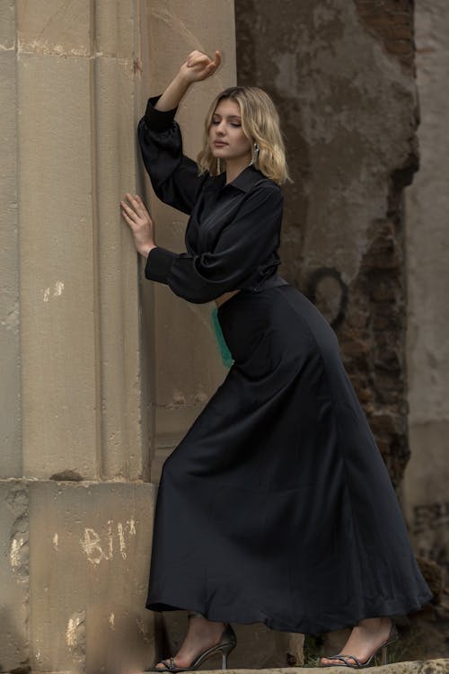 Blonde Woman Wearing Black Dress