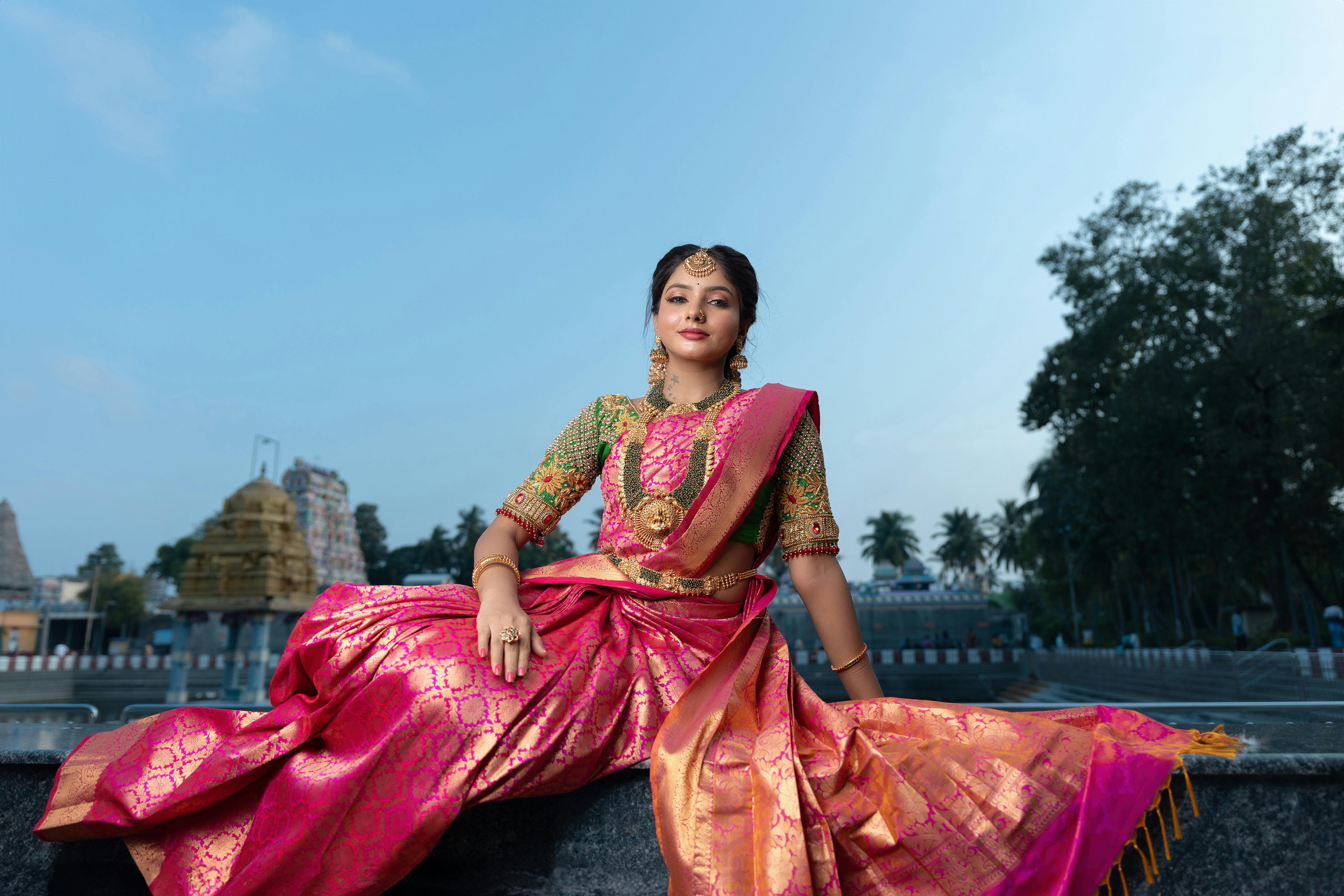 Beautiful Indian Young Girl In Traditional Saree Posing Outdoors Stock  Photo, Picture and Royalty Free Image. Image 147638292.