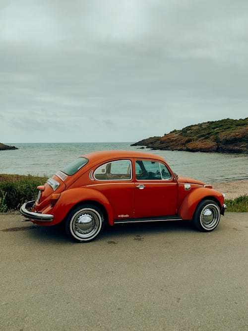 Vintage Volkswagen Beetle Parked on the Shore 