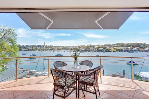 Table and Chairs on Terrace in Harbor