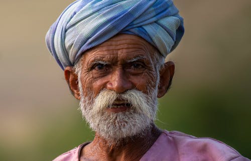 Portrait of an Elderly Man with a Gray Beard and Mustache Wearing a Turban 