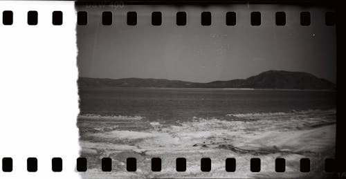 View of Sea and Hills on a Vintage Filmstrip 