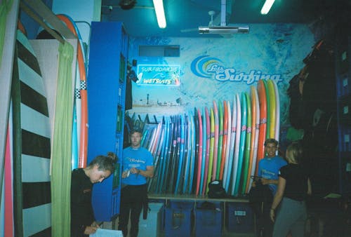 Four People Inside Surfing Building