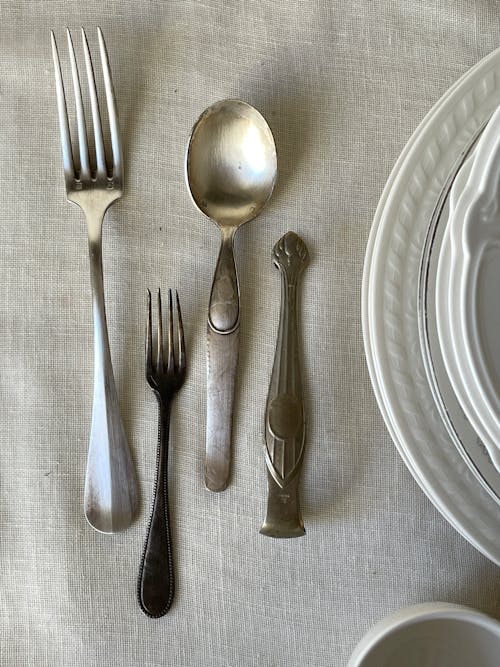 Free Vintage Cutlery Lying on the Table  Stock Photo