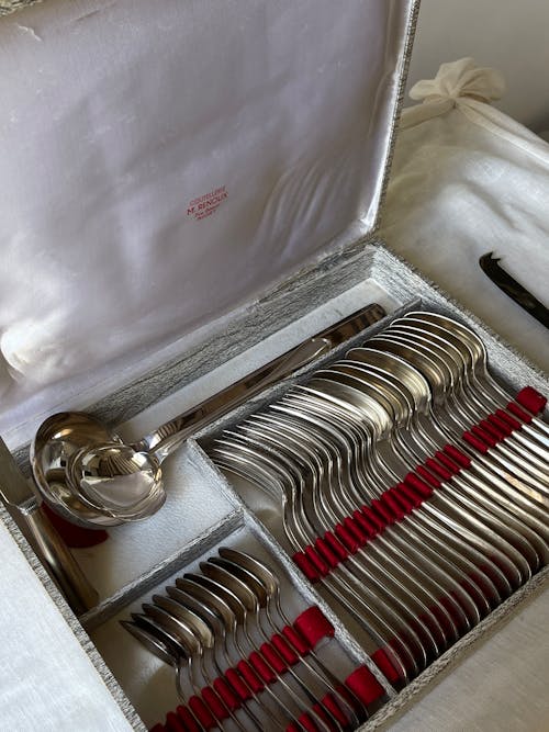 A Box with Vintage Cutlery 