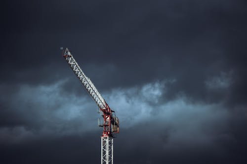 Crane Under Cloudy Sky