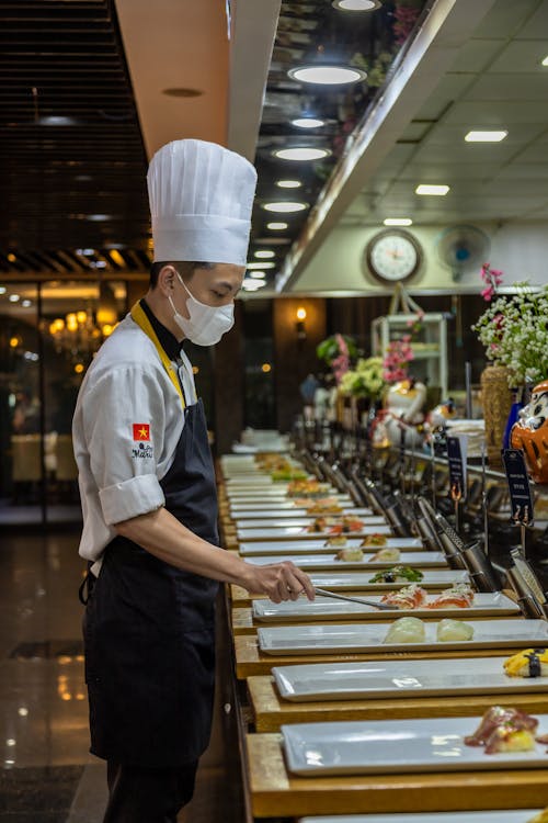 Chef Preparing Dishes in a Restaurant