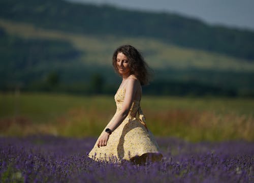 Woman Walking in Lavender Meadow