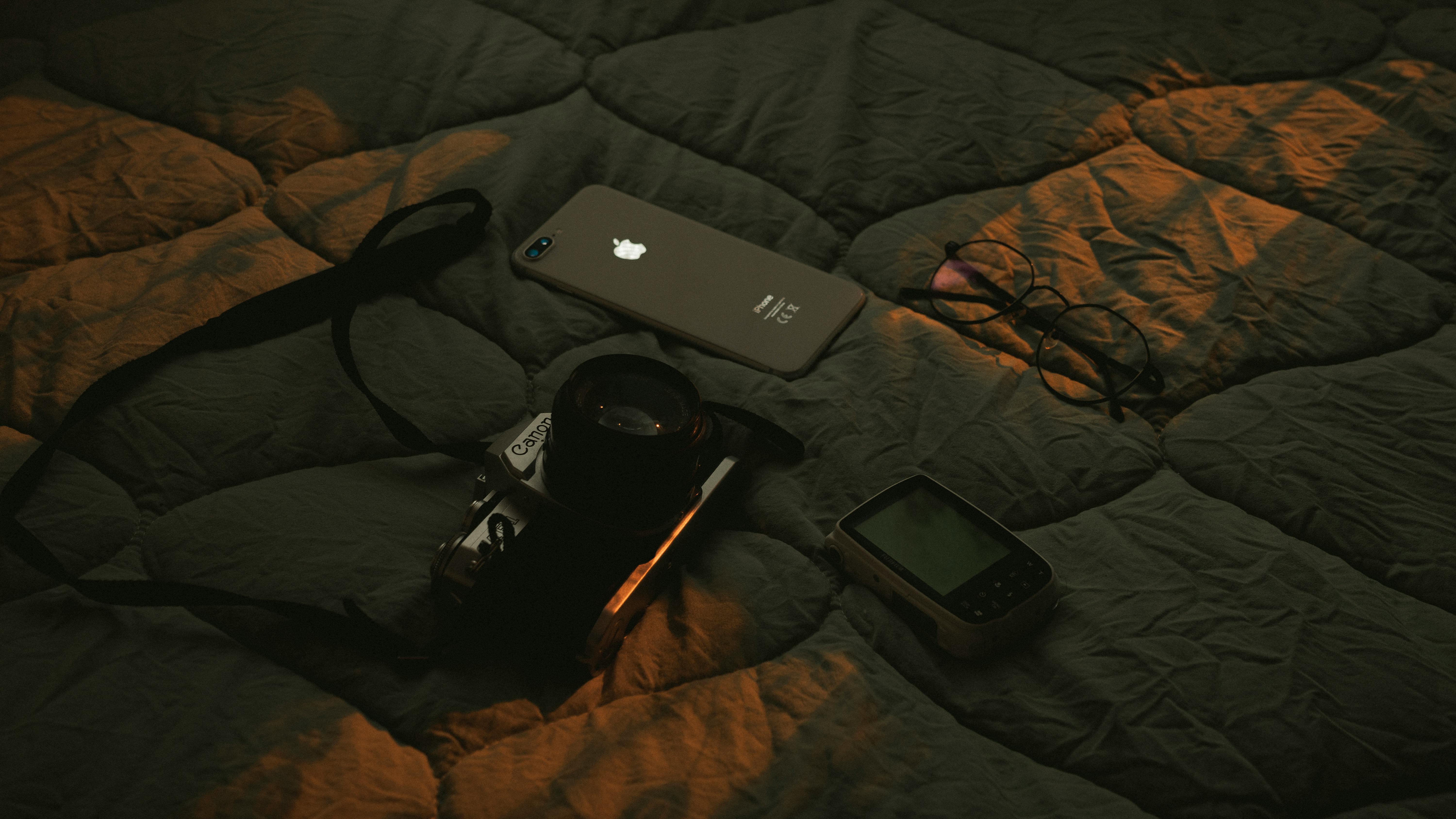 IPhone, Camera and Eyeglasses · Free Stock Photo