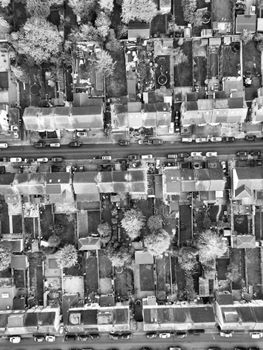 Aerial black and white image of residential streets in Luton, showcasing urban architecture.