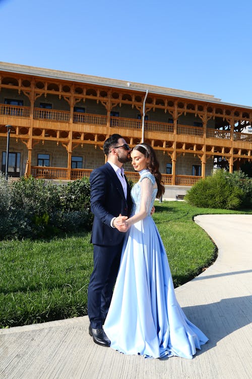 Couple in Blue Dress and Suit