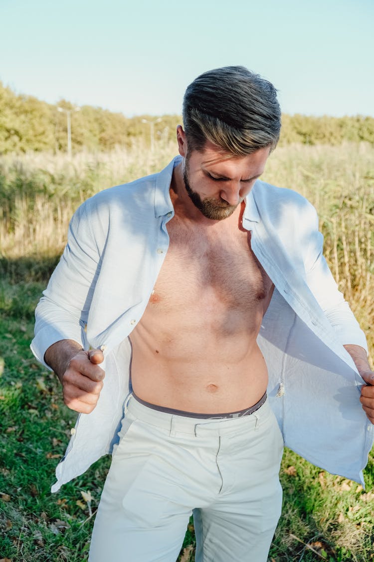 Blonde Man Showing His Muscular Stomach