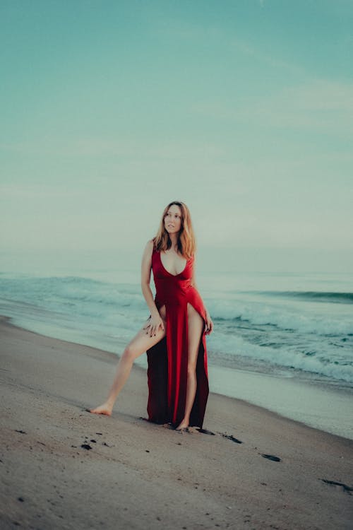 Model in Red Dress on Beach