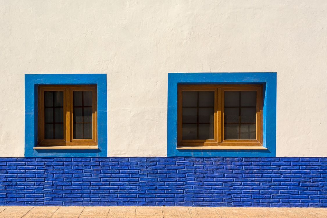 Blue Windows in a House Building · Free Stock Photo
