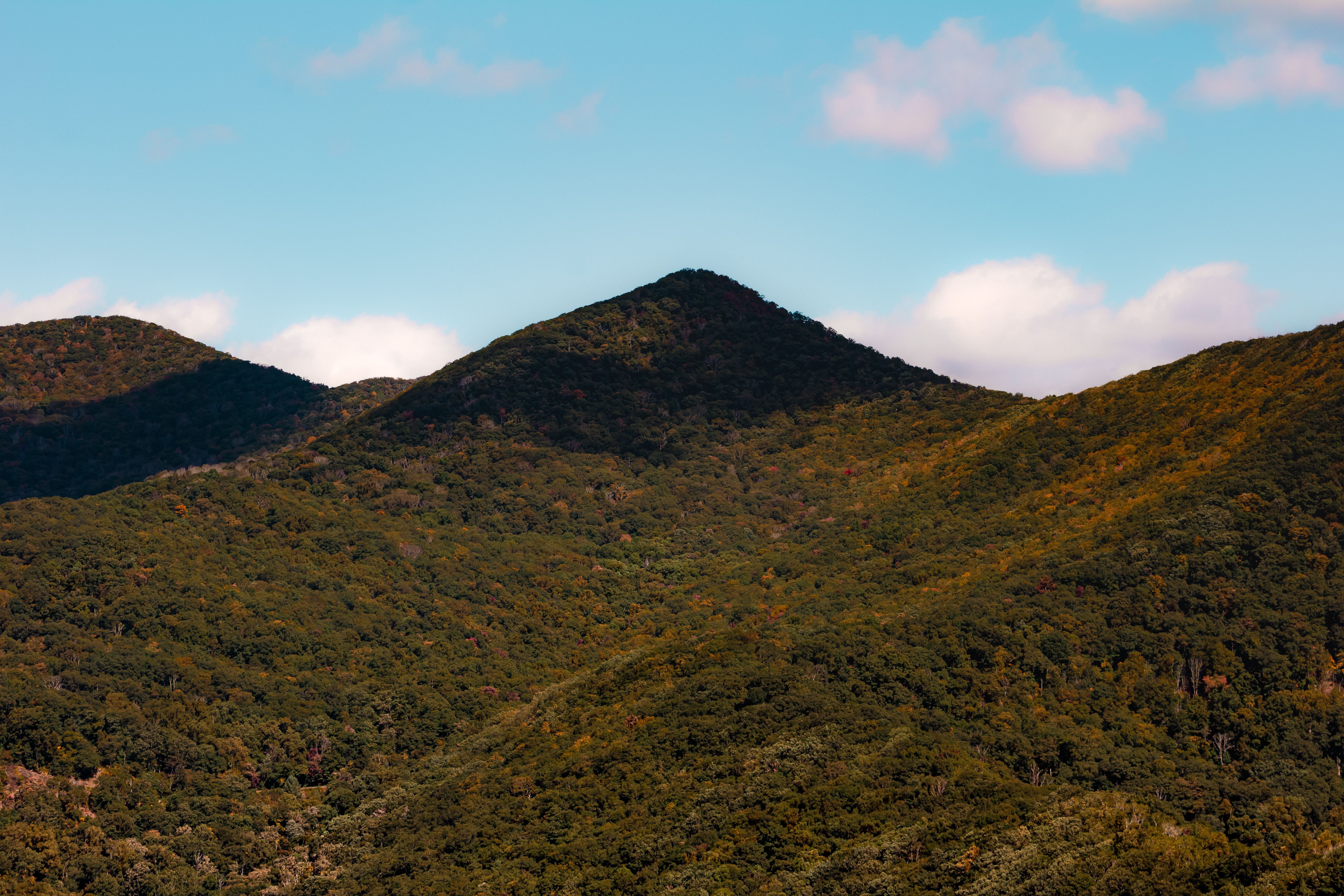 View of Mountains under Blue Sky · Free Stock Photo