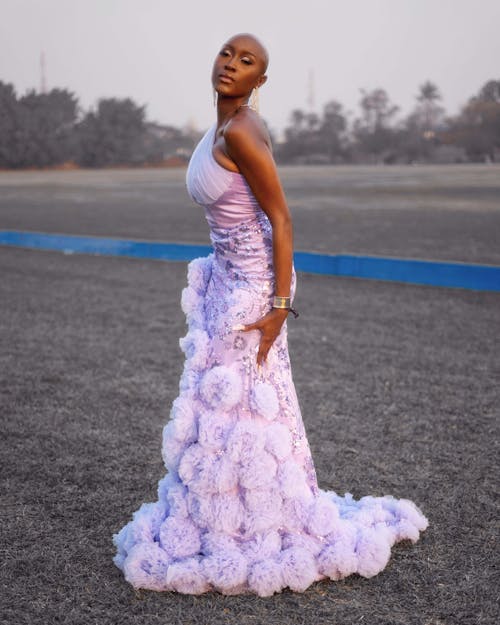 African Woman Posing in Pink Dress 
