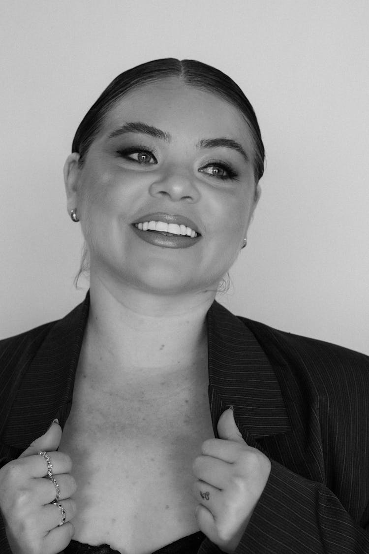 Black And White Portrait Of A Young Smiling Woman 