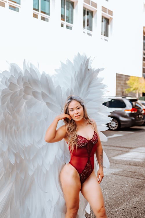Woman in Red Costume with Angel Wings