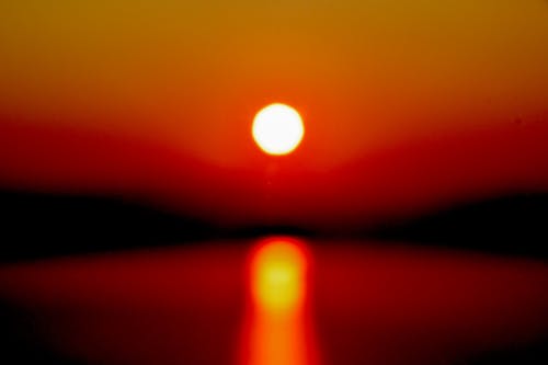 Photos gratuites de lever du soleil tôt, orange sanguine, paysage côtier