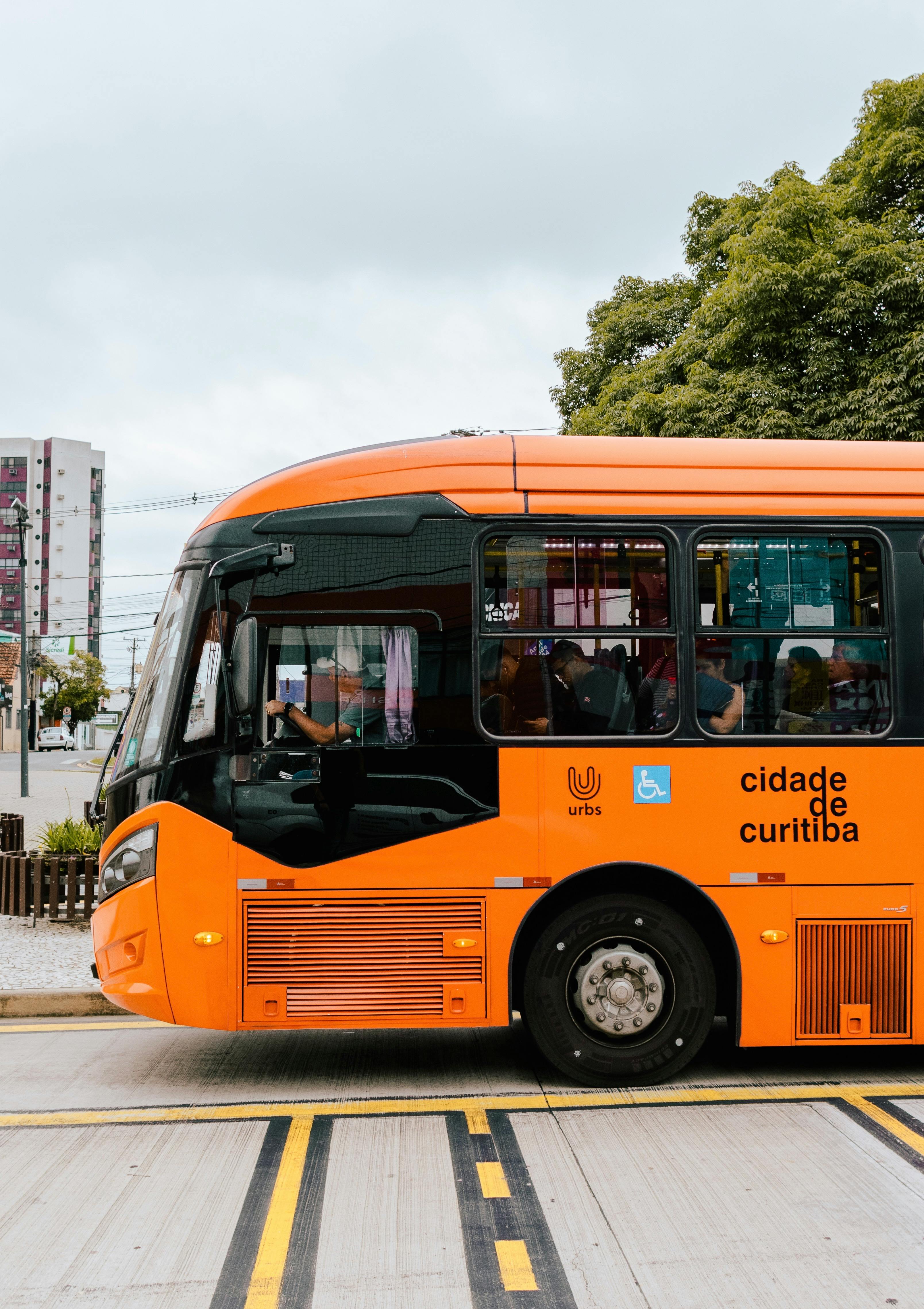 Orange Bus on Street in Curitiba · Free Stock Photo