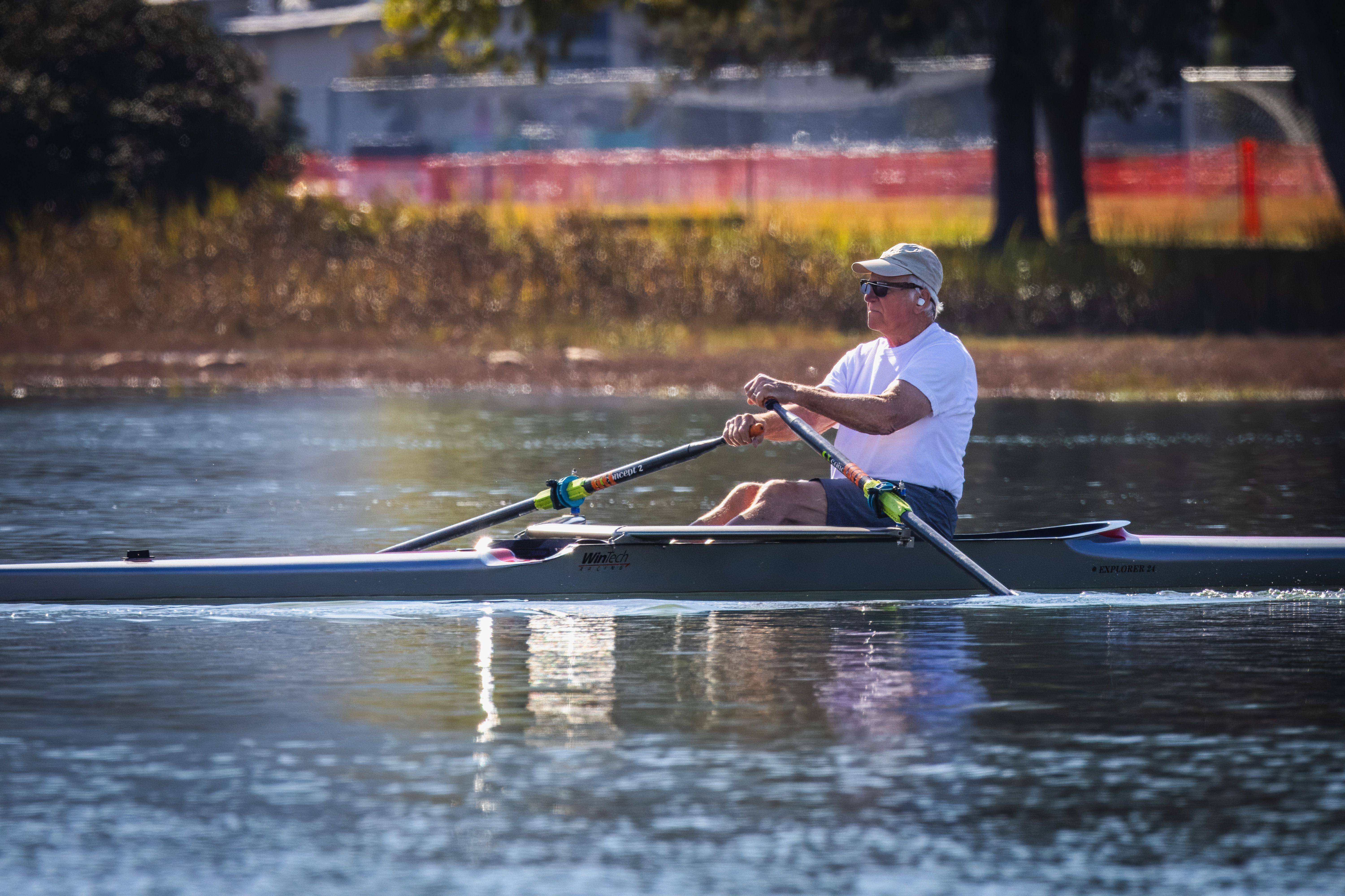 Elderly Man Rowing in Canoe · Free Stock Photo