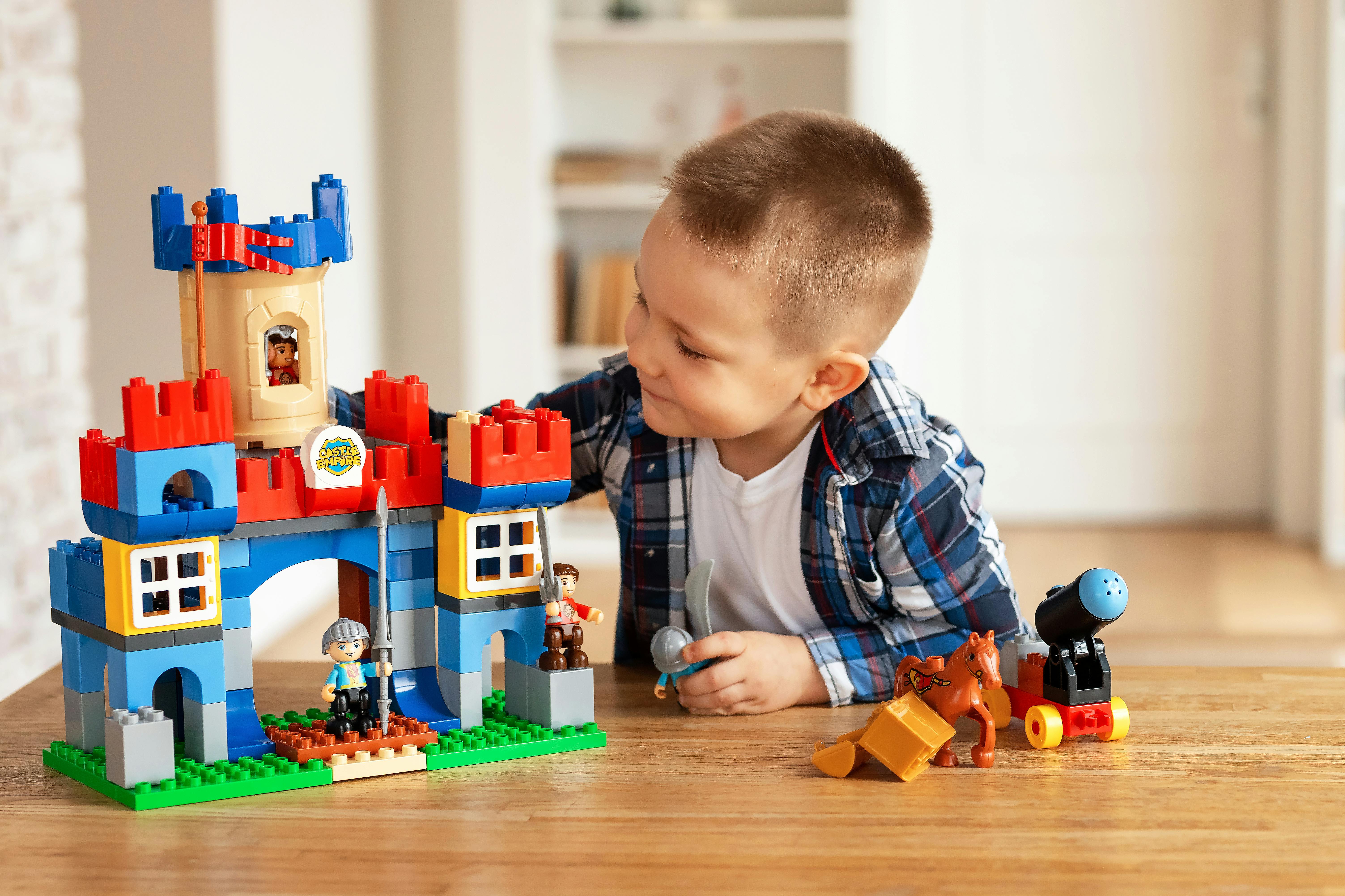 boy playing with bricks