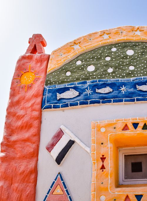 Free Vibrant decorative artwork on a Nubian village wall showcasing cultural symbols and colorful patterns. Stock Photo