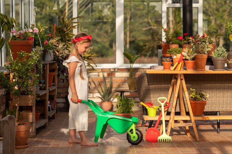 Girl In Greenhouse