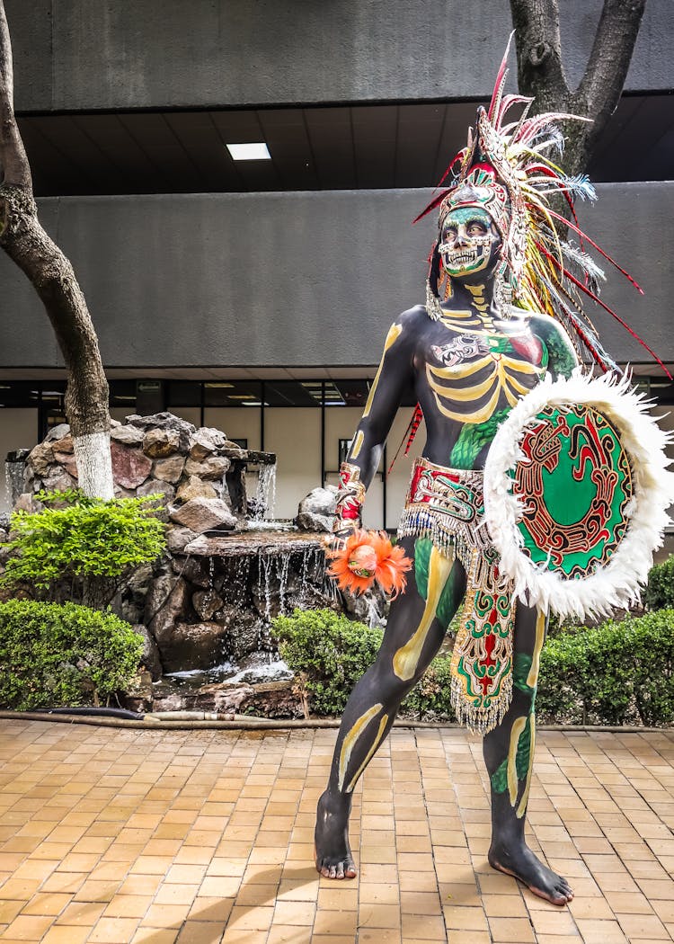 Aztec Warrior With Shield On Street