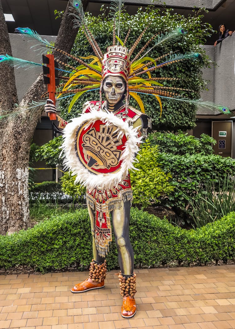 Man Dressed As Warrior With Shield For Dia De Muertos