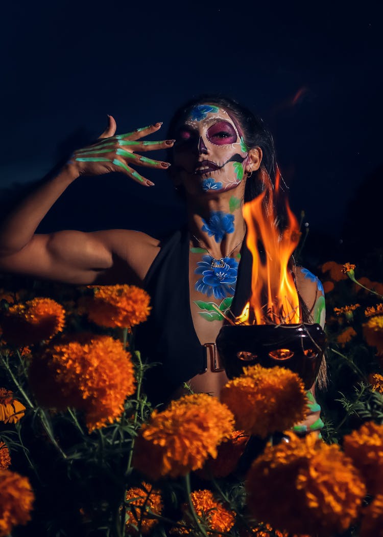 Catrina Near Flame At Night