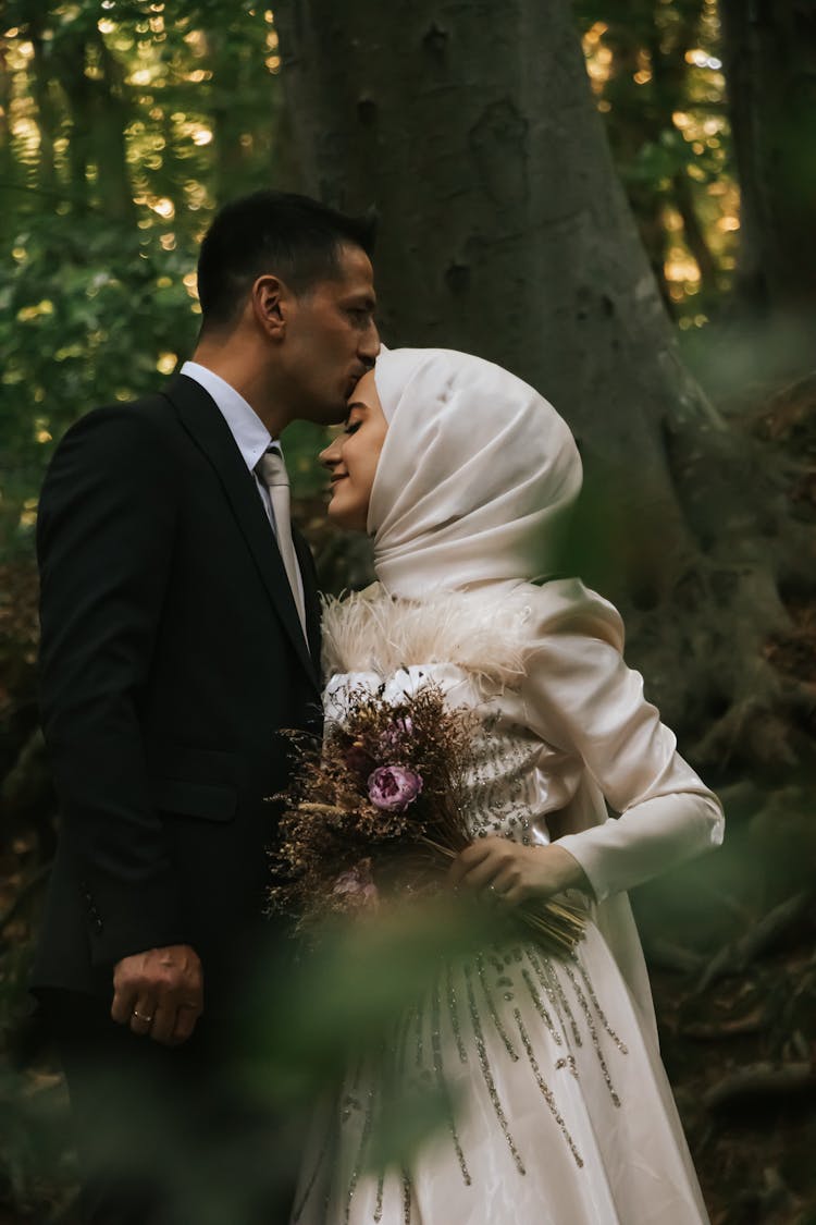 Newlywed Couple Kissing