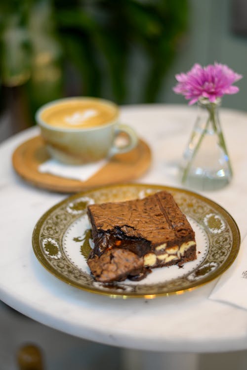 Free Dessert and Coffee on a Garden Table Stock Photo