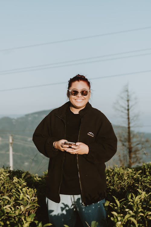 Smiling Woman in Sunglasses