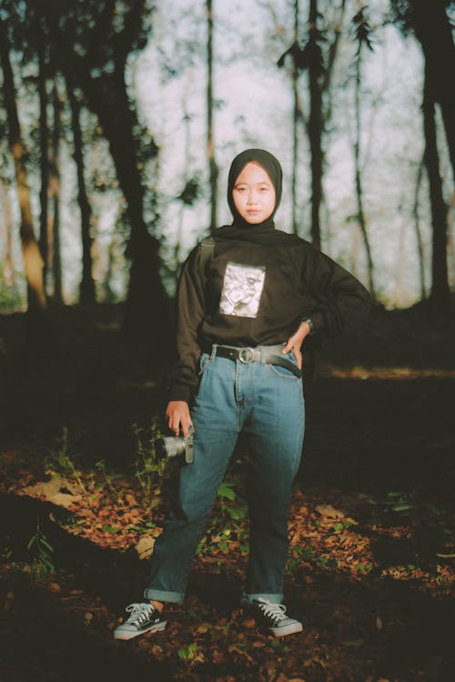 Woman in Hijab Standing in Forest