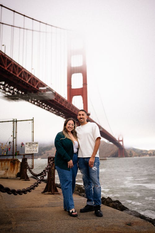Couple Posing in Front of Golden Gate Bridge 
