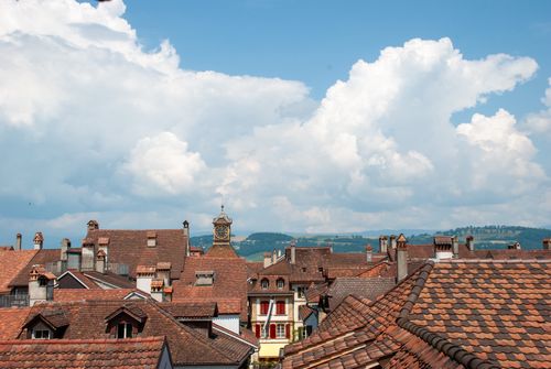 Free stock photo of clouds, cloudy sky, rooftops Stock Photo