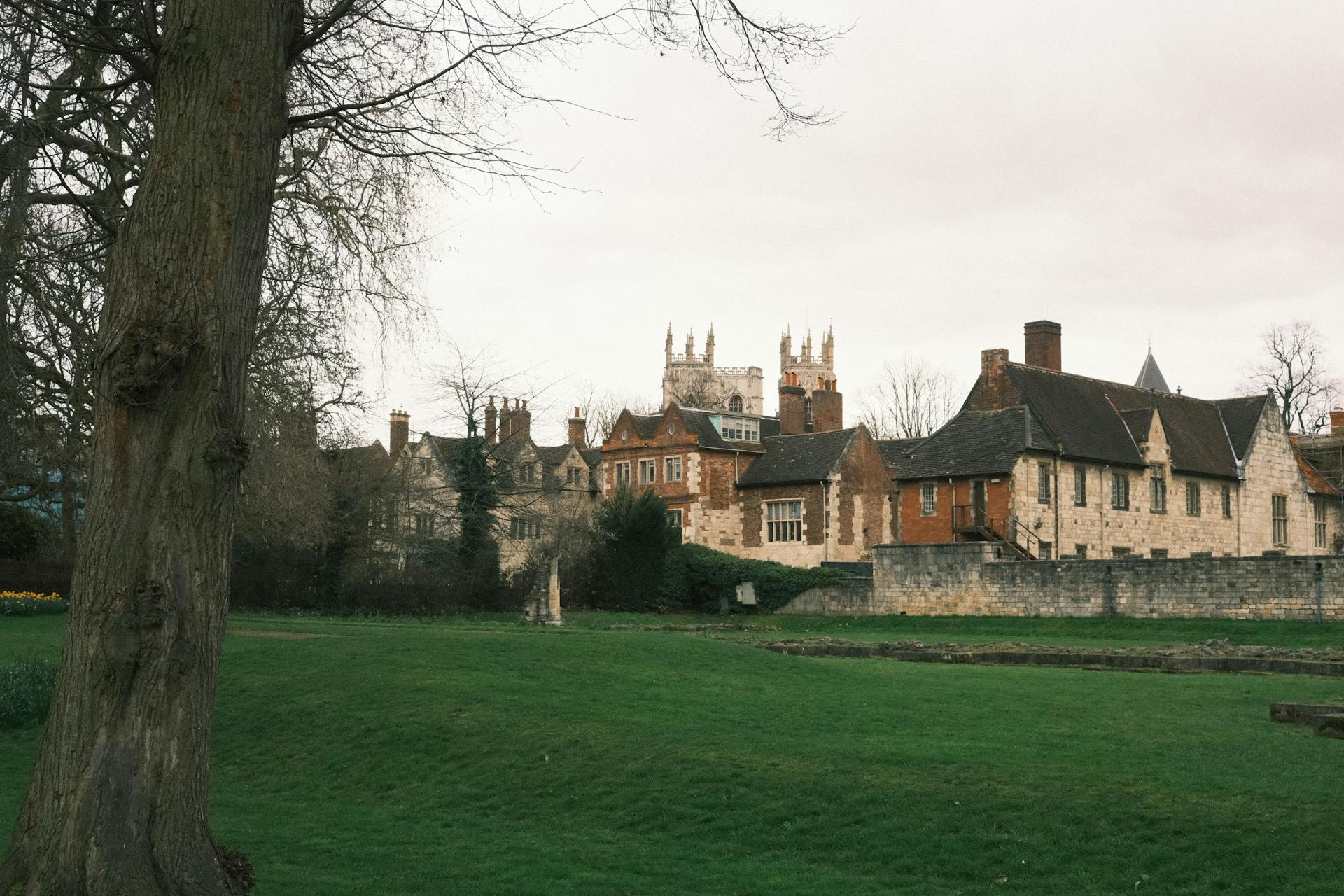 Historic Brick Houses with the Towers of York Minster Cathedral in the Background