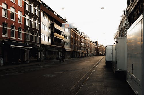 Townhouses Along an Empty Street at Dawn