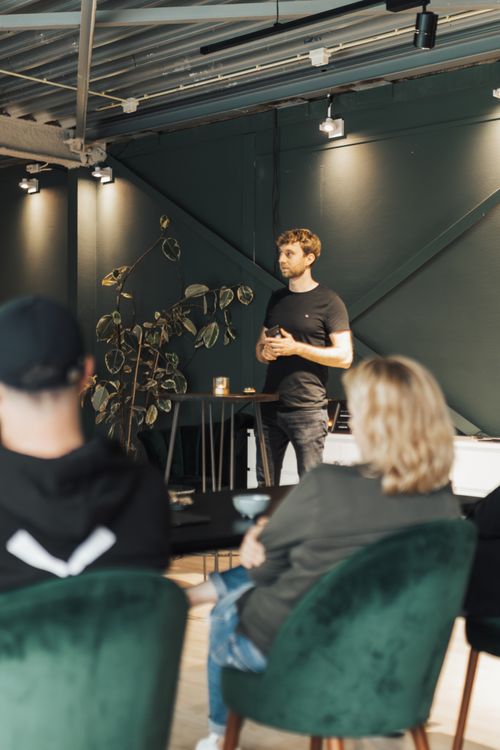 Free Business meeting with presenter in a contemporary office setting. Stock Photo
