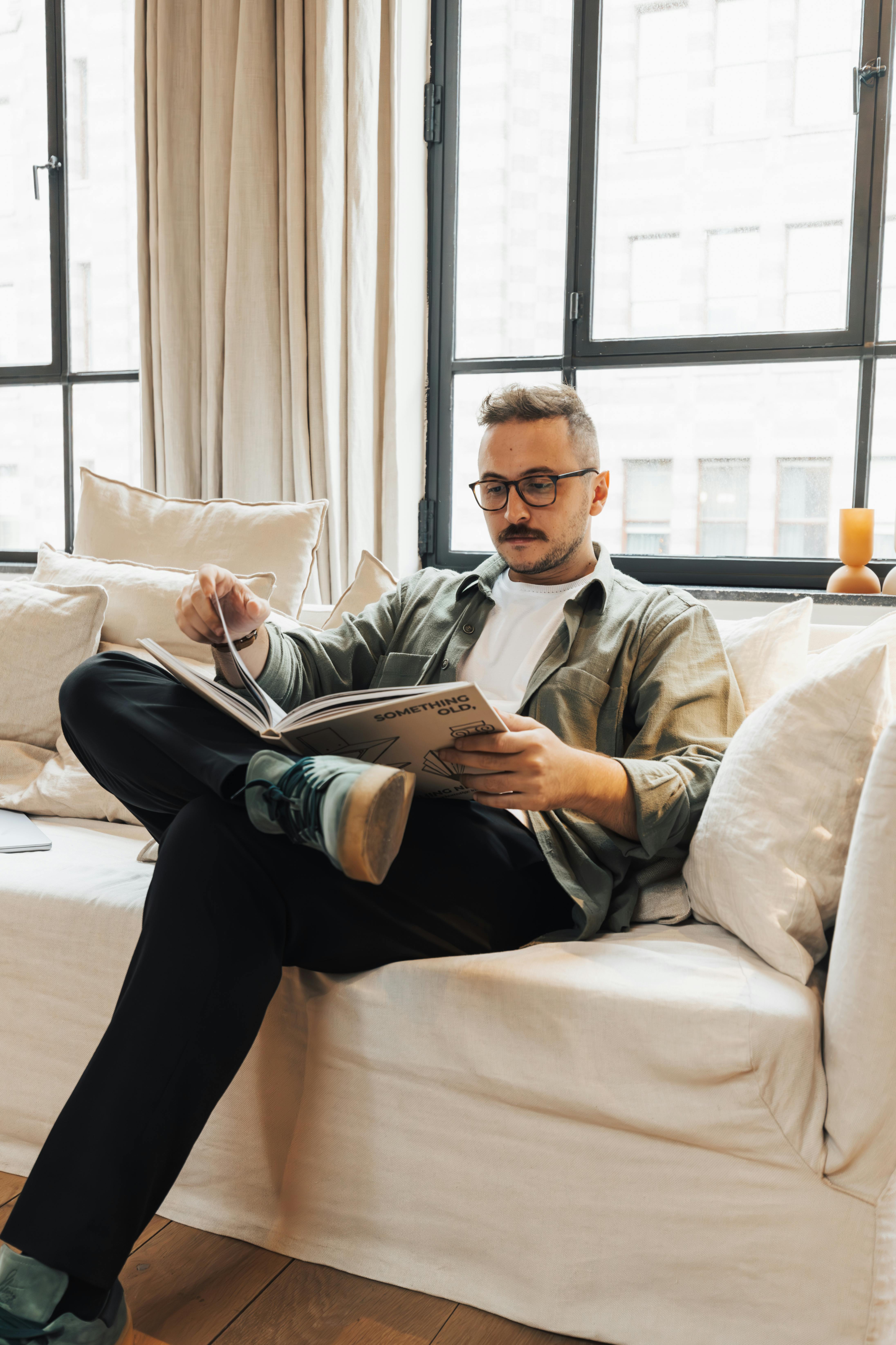 Photo of a Man Reading a Book · Free Stock Photo