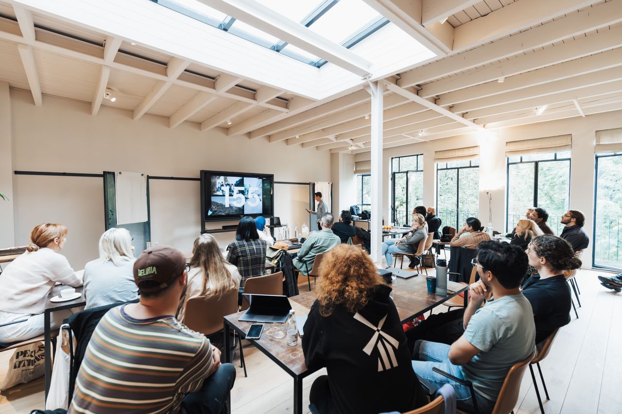 People gathering during an engaging presentation and workshop.