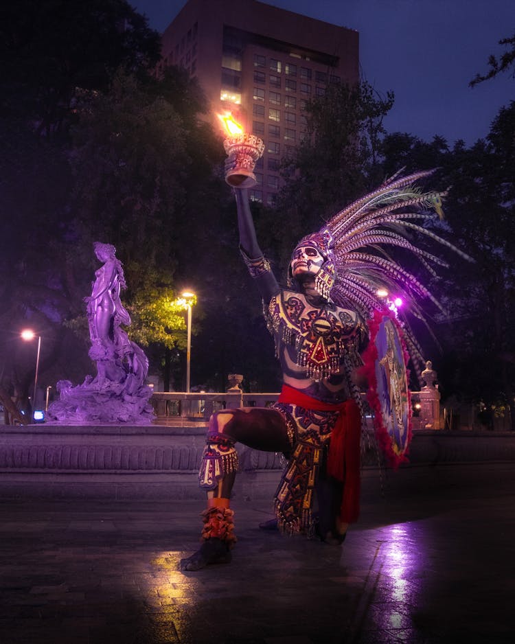 Man In A Traditional Aztec Costume On A Square 