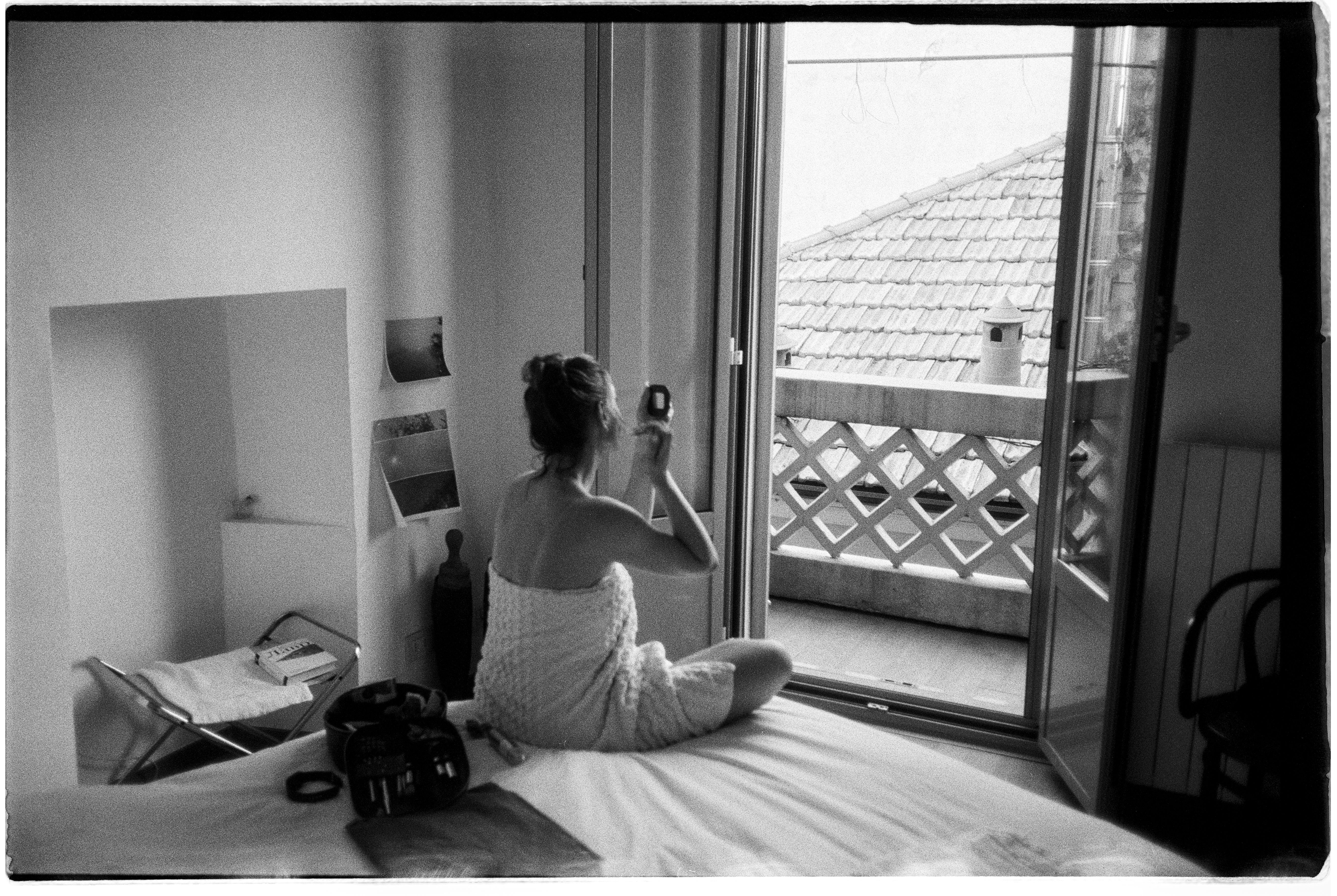 Woman Doing Morning Routine on Bed · Free Stock Photo
