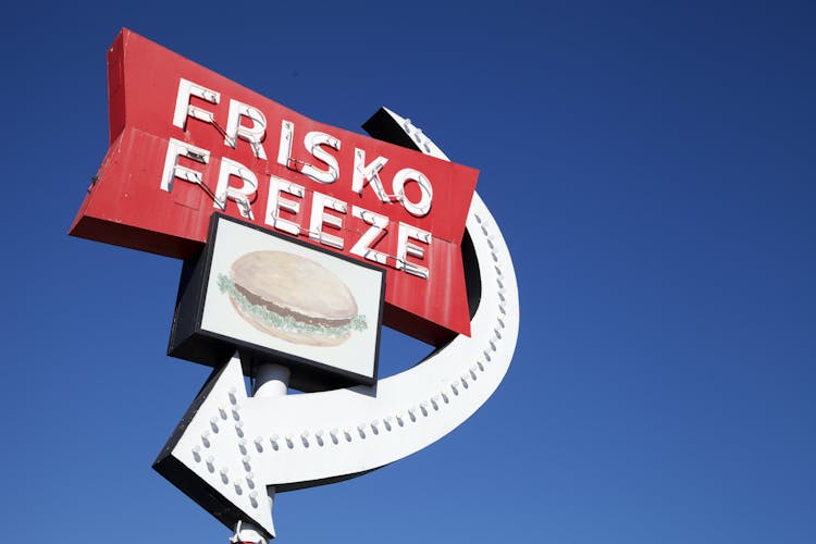 Frisko Freeze Logo Under Clear Sky