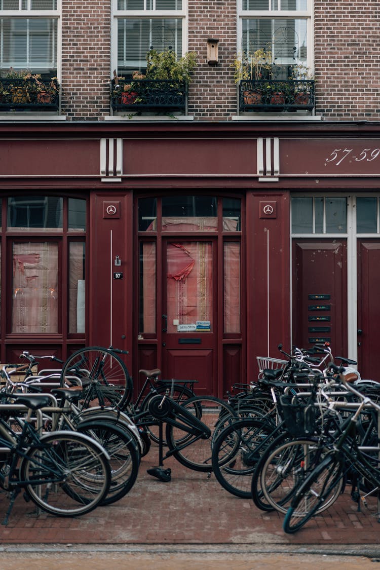 Bicycles On Pavement In Amsterdam, Netherlands