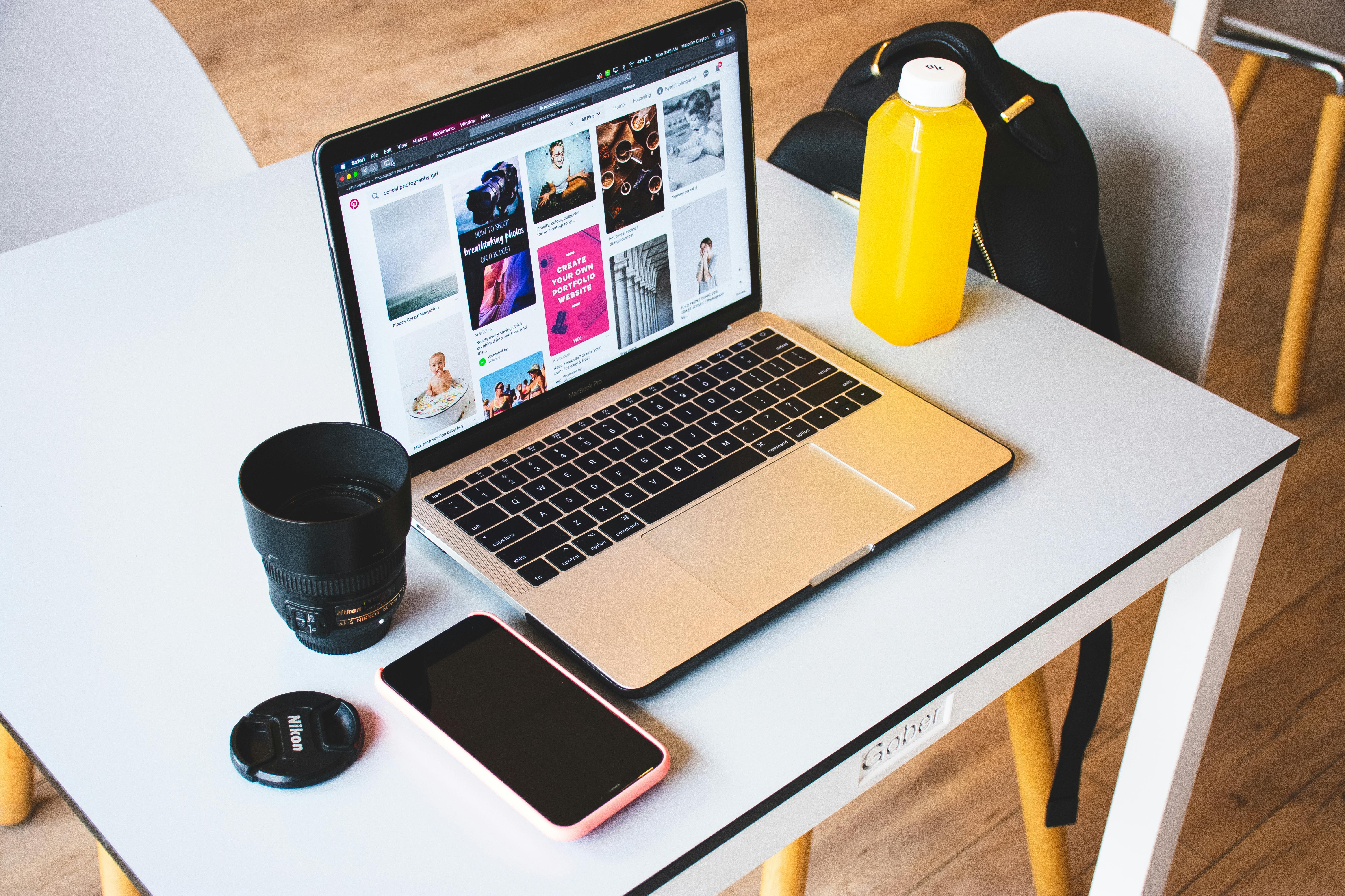 Macbook Pro On Desk · Free Stock Photo