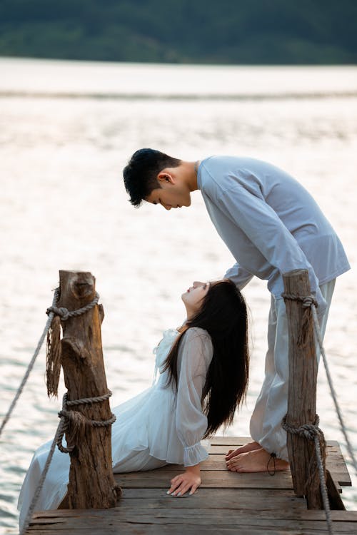 Couple Posing on a Pier 